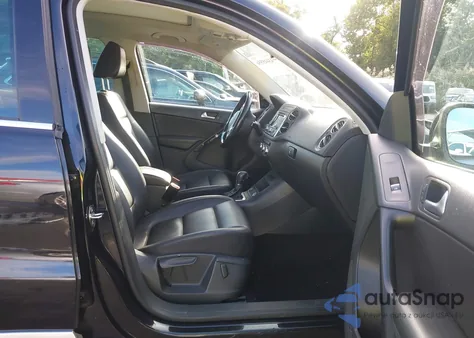 2014 Volkswagen Tiguan Sel from USA, damaged, VIN WVGBV3AX0EW550323